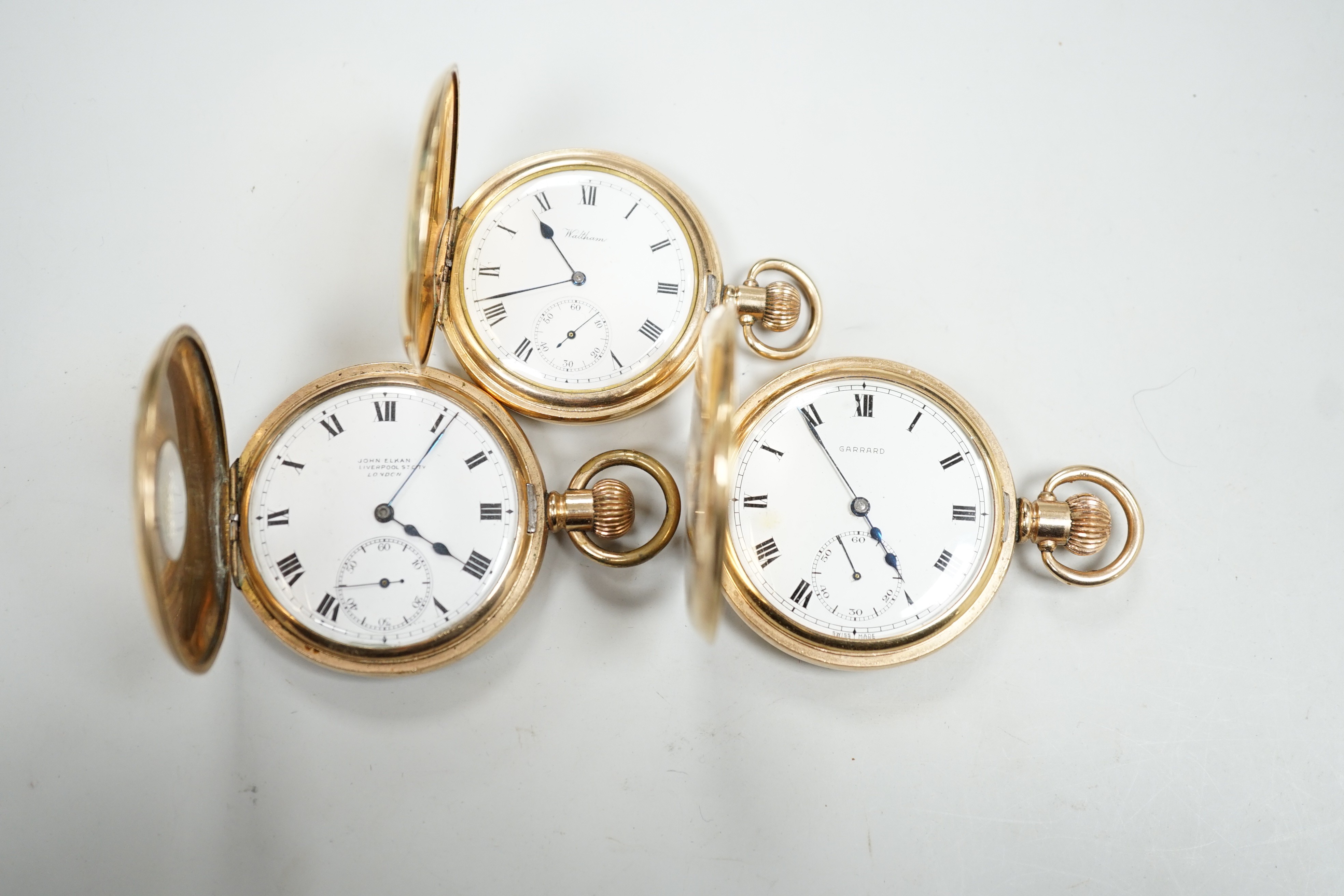 A gold plated Waltham hunter keyless pocket watch and two gold plated half hunter pocket watches, John Elkin and Garrard.